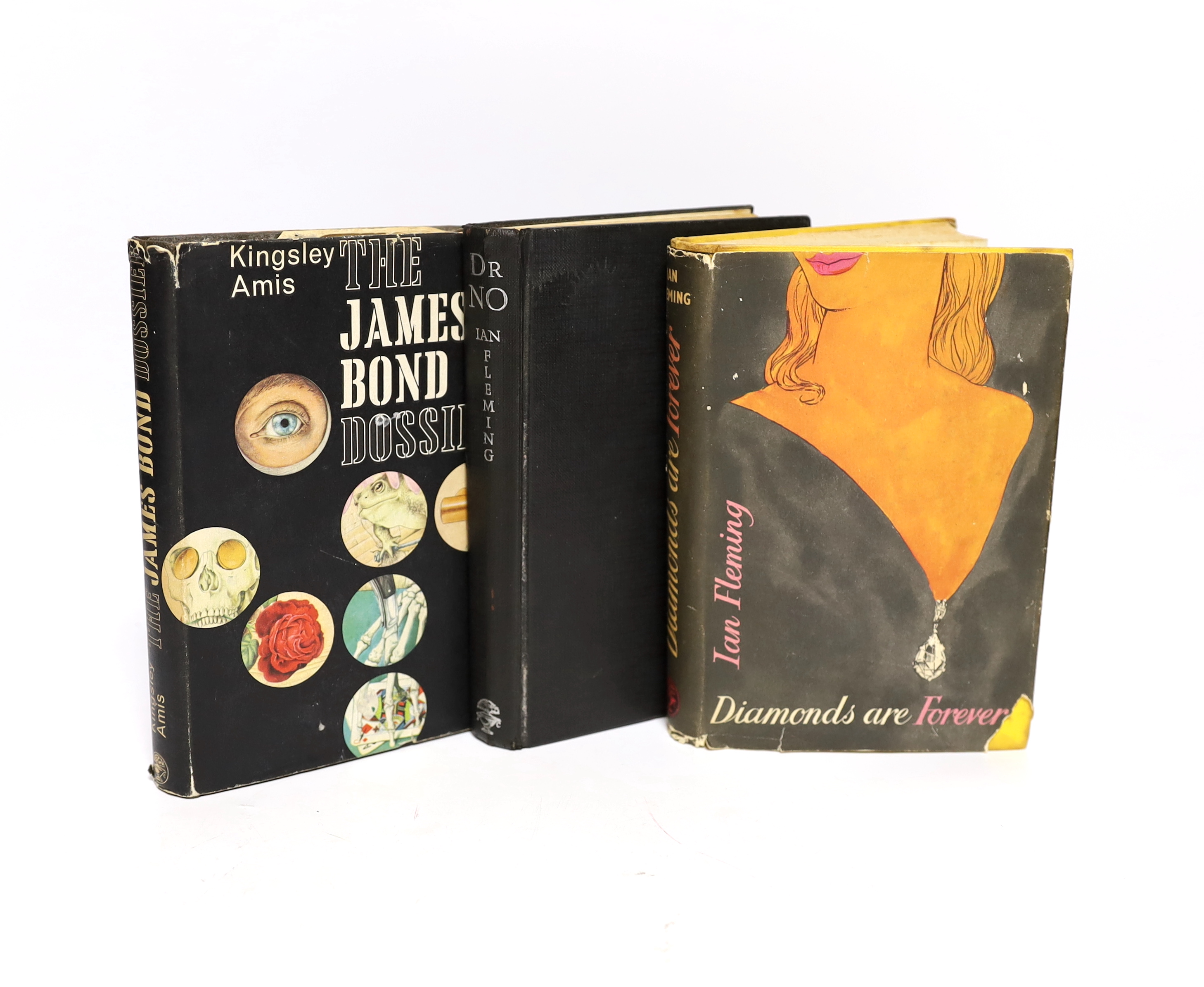 Fleming, Ian - Diamonds Are Forever, 1st edition, remainder copy, outside bound by others in yellow cloth (spine and boards spotted, front board stamped Ex Libris), 8vo, in an unclipped d/j, (leaves trimmed to 182 x122mm